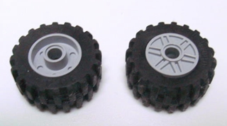 55981c02 | Wheel 18mm D. x 14mm with Pin Hole, Fake Bolts and Shallow Spokes with Black Tire 30.4 x 14 Offset Tread | LEGOPART