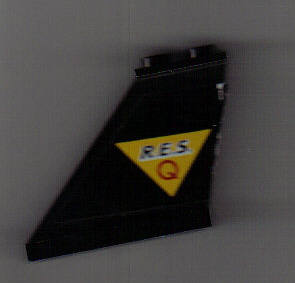 2340pb015L | Tail 4 x 1 x 3 with Black 'R.E.S.' and Red 'Q' on Yellow Triangle Pattern Model Left Side | LEGOPART