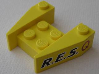 2399pb03 | Wedge 3 1/2 x 4 without Stud Notches with Black 'R.E.S.' and Red 'Q' on Yellow Background Pattern on Both Sides | LEGOPART