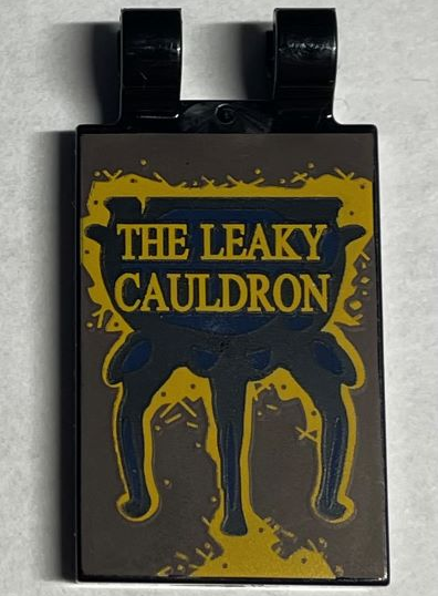 30350bpb142 | Tile, Modified 2 x 3 with 2 Open O Clips with Gold 'THE LEAKY CAULDRON' Sign Pattern | LEGOPART